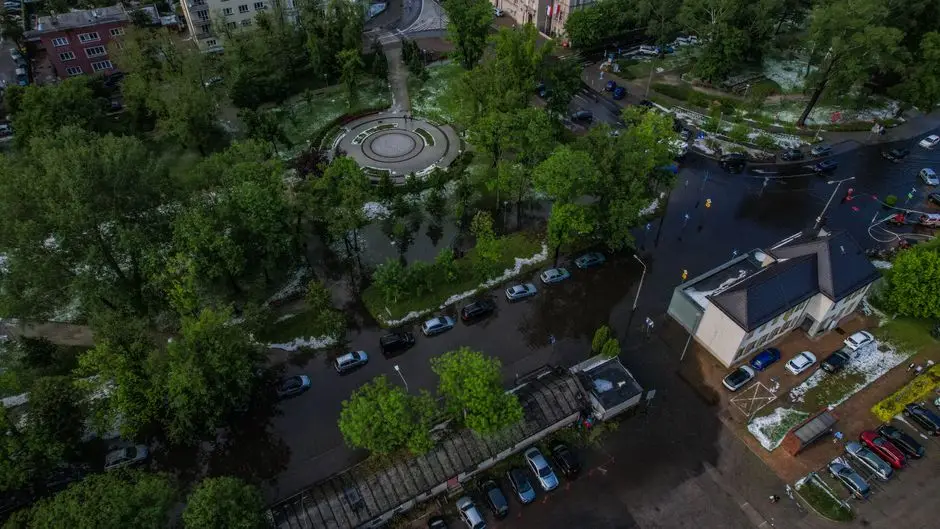 Aerial shot of a flooded city park and surrounding streets after a storm.
