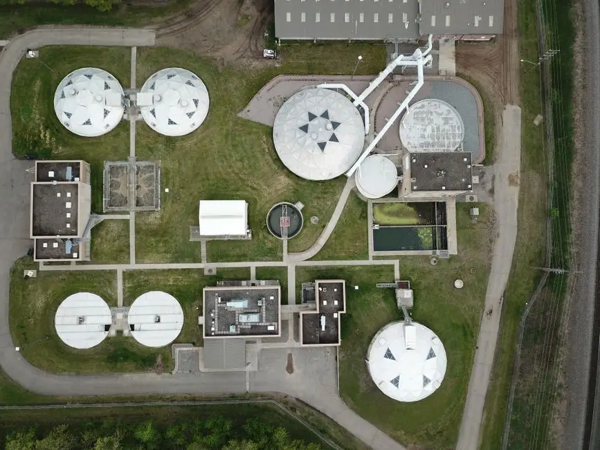 Aerial view of a structured water treatment plant showcasing various components.